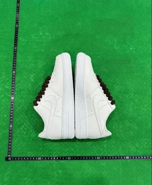 27 (brown shoelaces)